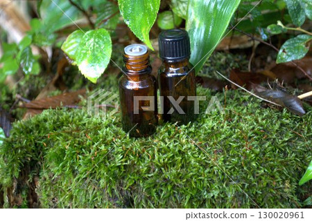 Small aroma oil bottle in the forest 130020961