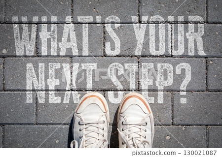 Whats Your Next Step. Decision Making Concept with Sneakers Standing on Pavement Whats Your Next Step. Decision Making Concept with Sneakers Standing on Pavement 130021087