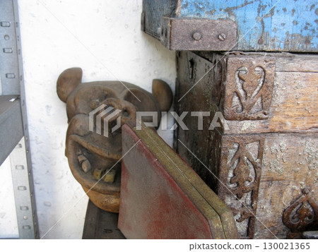Ornate Carved Wooden Chest with Ceramic Mask and Metal Plate on Shelf Ornate Carved Wooden Chest with Ceramic Mask and Metal Plate on Shelf 130021365
