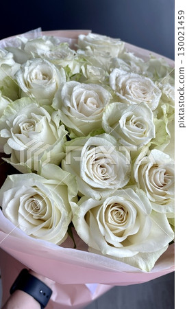 Elegant Bouquet of Pristine White Roses Wrapped in Soft Pink Paper Elegant Bouquet of Pristine White Roses Wrapped in Soft Pink Paper 130021459