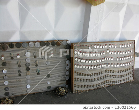 Vintage Medal Display Boards with Ribbons Showcasing a Collection of Awards Vintage Medal Display Boards with Ribbons Showcasing a Collection of Awards 130021560