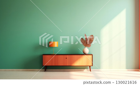 Mid century modern interior with orange sideboard and green wall 130021616