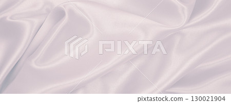 Smooth elegant pink silk or satin texture as wedding background. Luxurious background design 130021904