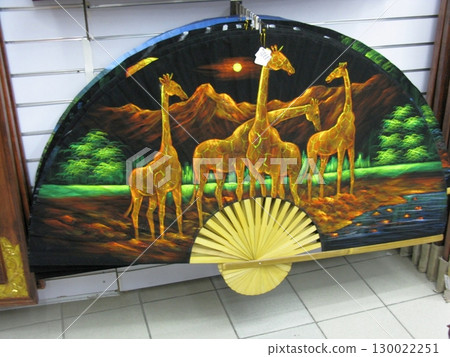 Decorative Fan with Golden Giraffes and Mountain Landscape Under a Crescent Moon 130022251