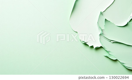 Textured light green abstract acrylic paint strokes on canvas 130022694