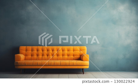 Stylish orange sofa against teal wall in minimalist living room interior design 130022924