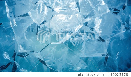 Translucent icy shards glowing with frosty light. 130025178