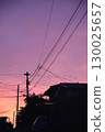 Twilight sky and telephone pole silhouette and sunset 130025657