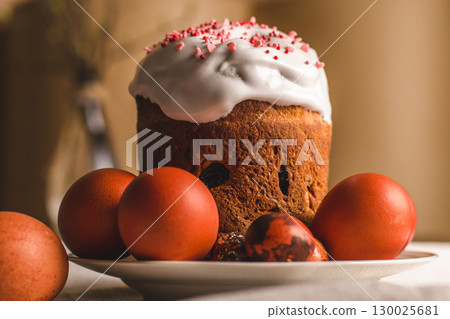 delicious easter cake topped with frosting colorful eggs on table festive spring celebration closeup 130025681