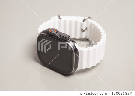 Modern Wireless Smart watch on gray background 130025857
