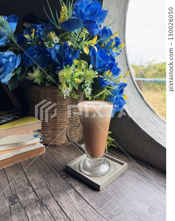 Delicious Cappuccino with Perfect Foam and Cocoa Dusting in a Minimalist White Cup 130026050