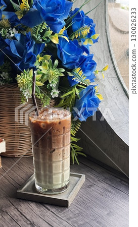 Refreshing Iced Mint Mocha Coffee with Creamy Swirl and Chocolate Drizzle Refreshing Iced Mint Mocha Coffee with Creamy Swirl and Chocolate Drizzle 130026233