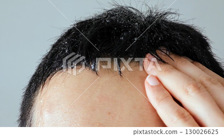 A person sweating profusely 130026625