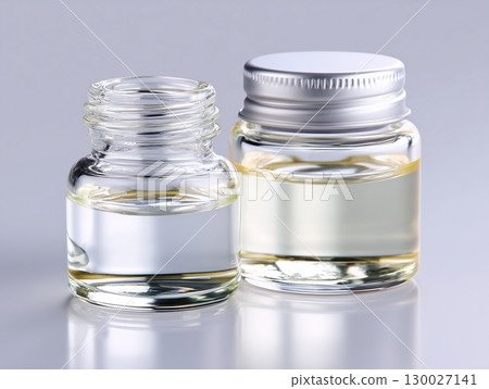 Industrial chemical liquid in a small glass bottle 130027141