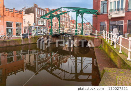 Drawbridge over canal in Leiden Netherlands at dawn Drawbridge over canal in Leiden Netherlands at dawn 130027231