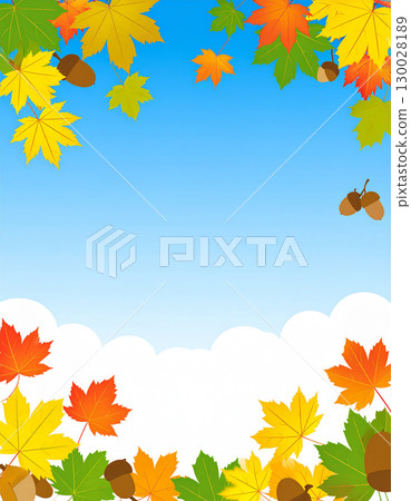 Autumn frame with autumn leaves and acorns against a refreshing blue sky background 130028189