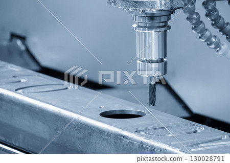 The CNC milling machine hole boring process at the battery frame parts by flat nose end mill tool in the light blue scene. The CNC milling machine hole boring process at the battery frame parts by flat nose end mill tool in the light blue scene. 130028791