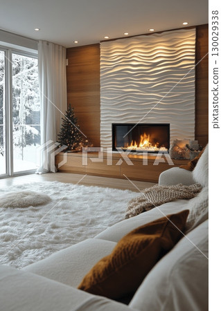 Cozy white living room with fireplace and Christmas tree 130029338