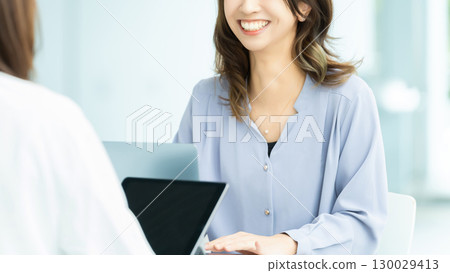 Two women/businesswomen having a meeting Two women/businesswomen having a meeting 130029413