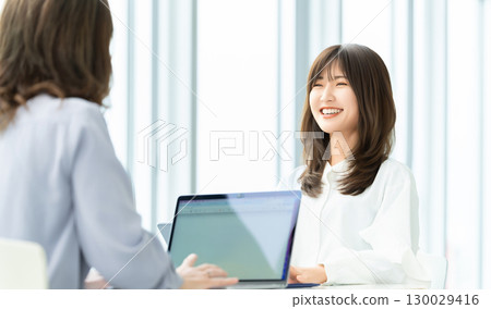 Two women/businesswomen having a meeting 130029416