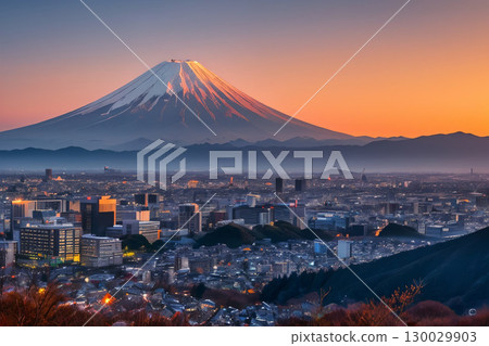 Mount Fuji and the cityscape bathed in the setting sun 130029903