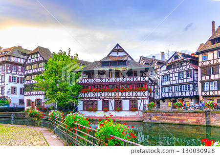 Strasbourg city historic centre The Petite France Quarter, Maison des Tanneurs half-timbered houses medieval buildings, quay embankment of River Ill canal in old town Centre, Alsace region, France 130030928