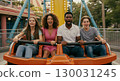Family enjoying the theme park 130031245
