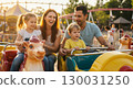 Family enjoying the theme park 130031250