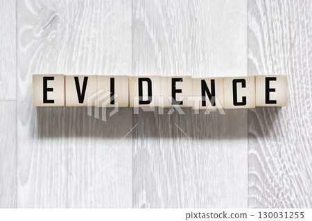 The concept of business and finance. There are wooden evidence blocks on the table. The concept of business and finance. There are wooden evidence blocks on the table. 130031255