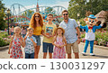 Family enjoying the theme park 130031297