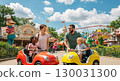 Family enjoying the theme park 130031300