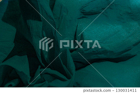 Texture for art projects. Crumpled paper in a shade of teal.Hypnotic textures backgrounds 130031411