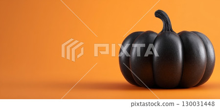 Matte Black Pumpkin on Orange Background for Halloween Mockup 130031448