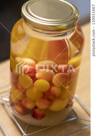 Canned compote in jars of various fruits and berries. Food Canned compote in jars of various fruits and berries. Food 130031667