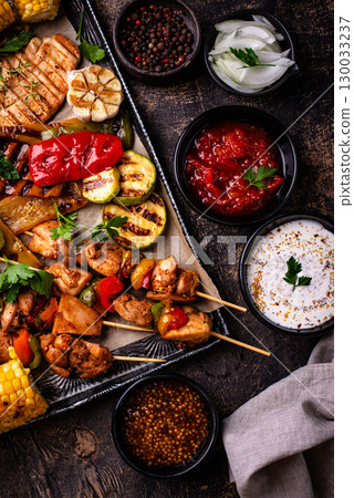 Assortment of grilled bbq meat and vegetables Assortment of grilled bbq meat and vegetables 130033237