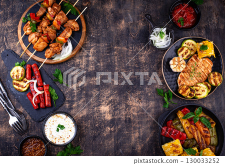 Assortment of grilled bbq meat and vegetables Assortment of grilled bbq meat and vegetables 130033252