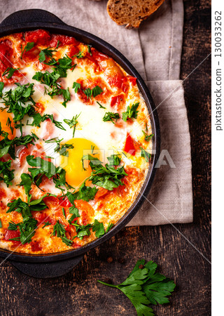 Shakshuka, traditional Jewish breakfast dish Shakshuka, traditional Jewish breakfast dish 130033262
