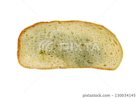 Moldy bread slice showing fungus growth Moldy bread slice showing fungus growth 130034145