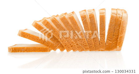 Stack of sliced white bread pieces isolated on white background Stack of sliced white bread pieces isolated on white background 130034331