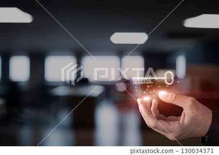 Holding the key to success in a modern workspace. Holding the key to success in a modern workspace. 130034371