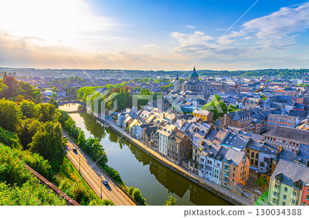 Namur cityscape, aerial panoramic view of Namur city historical center with Sambre river embankment and St Aubin's cathedral, skyline panorama of Namur fields on horizon, Wallonia Region, Belgium 130034388