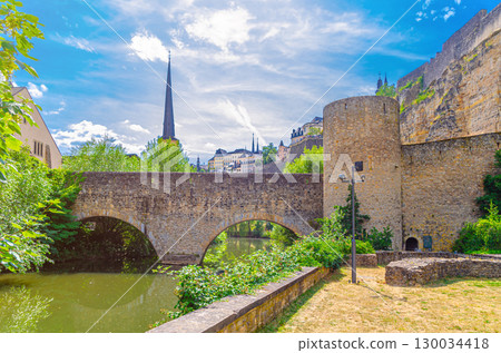 Alzette Valley in Grund district Lower town of Luxembourg City historical centre with Wenzel wall Pont du Stierchen bridge across Alzette river, Bock Promontory Casemates fortification wall 130034418
