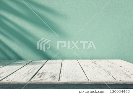 Minimal abstract background. Tree leaves light and shadows. Cosmetic product presentation. Premium podium. Pastel soft mint wall, white table. Showcase display case. Front view. Mockup ad. Green wall Minimal abstract background. Tree leaves light and shadows. Cosmetic product presentation. Premium podium. Pastel soft mint wall, white table. Showcase display case. Front view. Mockup ad. Green wall 130034463