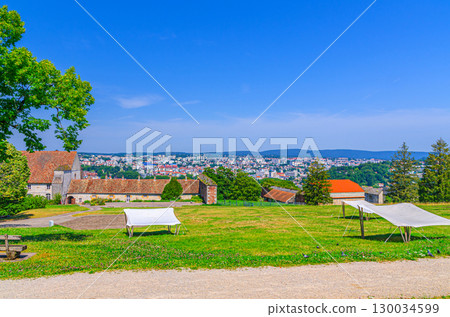 Saint-Etienne park of Citadel and aerial panoramic view of Besancon, Panorama of city historic centre skyline, cityscape in sunny summer day, Bourgogne-Franche-Comte region, France Saint-Etienne park of Citadel and aerial panoramic view of Besancon, Panorama of city historic centre skyline, cityscape in sunny summer day, Bourgogne-Franche-Comte region, France 130034599