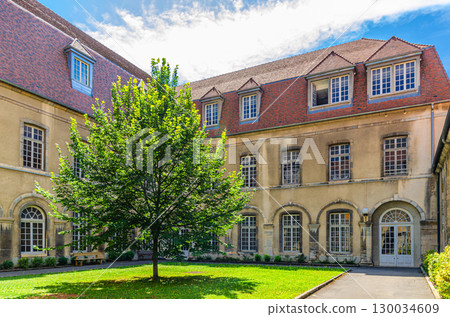 University of Franche-Comte building courtyard in Besancon old town centre ville, La boucle de city historic centre in sunny summer day, Bourgogne-Franche-Comte region, France 130034609