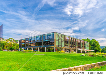Landtag von Baden-Wurttemberg state parliament modern glass building and garden with green grass lawn in old town Stuttgart city historic center, Baden-Wurttemberg state, Germany Landtag von Baden-Wurttemberg state parliament modern glass building and garden with green grass lawn in old town Stuttgart city historic center, Baden-Wurttemberg state, Germany 130034681