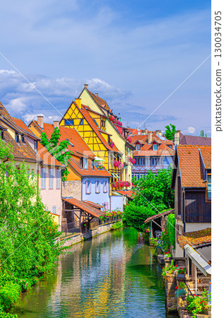 Colmar cityscape, Little Venice la Petite Venise area with old medieval houses on bank of river Lauch canals in old town Colmar city historic centre Krutenau quarter, Alsace Grand Est region, France Colmar cityscape, Little Venice la Petite Venise area with old medieval houses on bank of river Lauch canals in old town Colmar city historic centre Krutenau quarter, Alsace Grand Est region, France 130034705