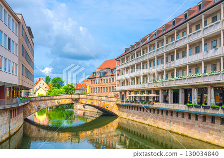 Meat Bridge Fleischbrucke across Pegnitz river water canal and old buildings in Old town Nuremberg city historical center, Middle Franconia region, Bavaria state, Germany Meat Bridge Fleischbrucke across Pegnitz river water canal and old buildings in Old town Nuremberg city historical center, Middle Franconia region, Bavaria state, Germany 130034840