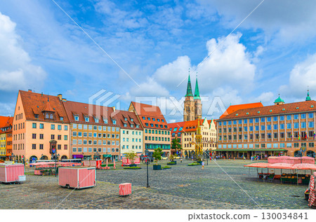 Old town Nuremberg city historical center with Main Market Square Hauptmarkt, colorful medieval buildings and St. Sebaldus Church towers, Middle Franconia region, Bavaria state, Germany Old town Nuremberg city historical center with Main Market Square Hauptmarkt, colorful medieval buildings and St. Sebaldus Church towers, Middle Franconia region, Bavaria state, Germany 130034841