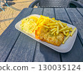 Cod with fries and sauerkraut. 130035124